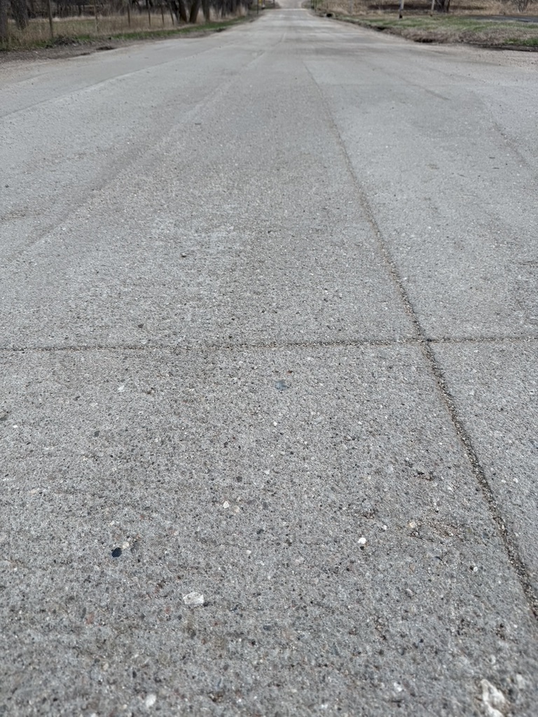 Close view of roller compacted concrete roadway surface